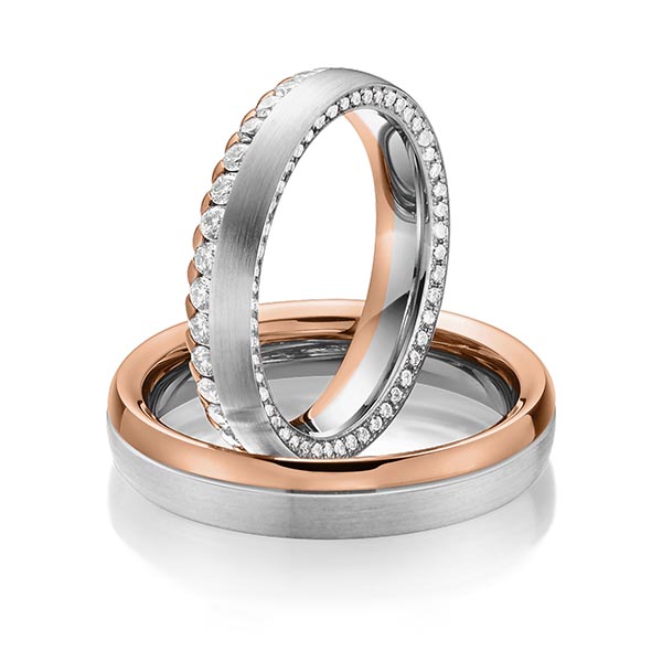 Paar bicolor Memoire-Trauringe/Eheringe in Graugold 585 Rotgold 585 vollausgefasst mit zus. 1,11 ct. Brillant tw, si von Steinberg - Q-1484-11 Paar bicolor Memoire-Trauringe/Eheringe in Graugold 585 Rotgold 585 vollausgefasst mit zus. 1,11 ct. Brillant tw, si von Steinberg - Q-1484-11