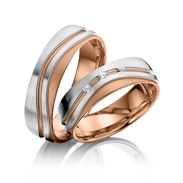 Paar bicolor Trauringe/Eheringe in außen Graugold 585 , innen Rotgold 585 mit zus. 0,07 ct. Brillant tw, si von Steinberg - T-1059-1 Paar bicolor Trauringe/Eheringe in außen Graugold 585 , innen Rotgold 585 mit zus. 0,07 ct. Brillant tw, si von Steinberg - T-1059-1