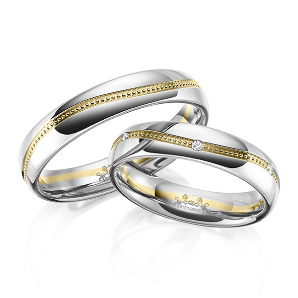 Paar bicolor Trauringe/Eheringe in Weißgold 585 Gelbgold 585 mit zus. 0,06 ct. Brillant tw, si von Steinberg - Q-1652-1 Paar bicolor Trauringe/Eheringe in Weißgold 585 Gelbgold 585 mit zus. 0,06 ct. Brillant tw, si von Steinberg - Q-1652-1