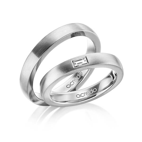 Paar klassische Trauringe/Eheringe in aussen Graugold 585 , innen Graugold 585 mit zus. 0,15 ct. Baguette-Diamant tw, vs von acredo - A-1467-4 Paar klassische Trauringe/Eheringe in aussen Graugold 585 , innen Graugold 585 mit zus. 0,15 ct. Baguette-Diamant tw, vs von acredo - A-1467-4