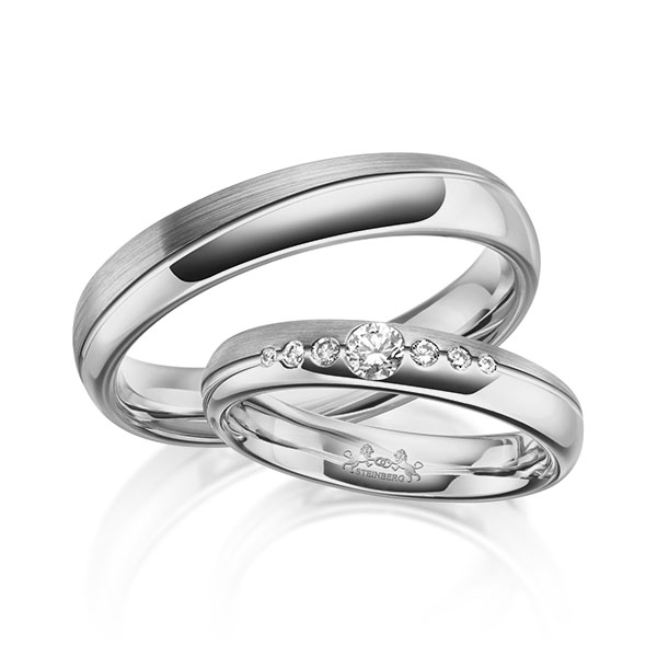 Paar klassische Trauringe/Eheringe in Graugold 585 mit zus. 0,16 ct. Brillant tw, si von Steinberg - Q-1625-5 Paar klassische Trauringe/Eheringe in Graugold 585 mit zus. 0,16 ct. Brillant tw, si von Steinberg - Q-1625-5