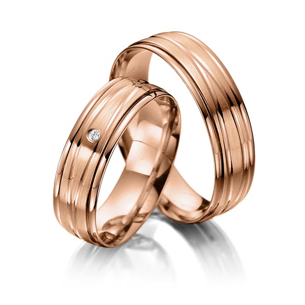 Paar klassische Trauringe/Eheringe in Rotgold 375 mit zus. 0,01 ct. Brillant tw, si von Steinberg - T-1093-4 Paar klassische Trauringe/Eheringe in Rotgold 375 mit zus. 0,01 ct. Brillant tw, si von Steinberg - T-1093-4
