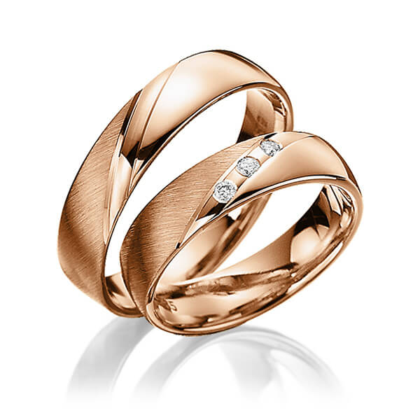 Paar klassische Trauringe/Eheringe in Rotgold 585 mit zus. 0,06 ct. Brillant tw, si von Steinberg - T-1124-4 Paar klassische Trauringe/Eheringe in Rotgold 585 mit zus. 0,06 ct. Brillant tw, si von Steinberg - T-1124-4