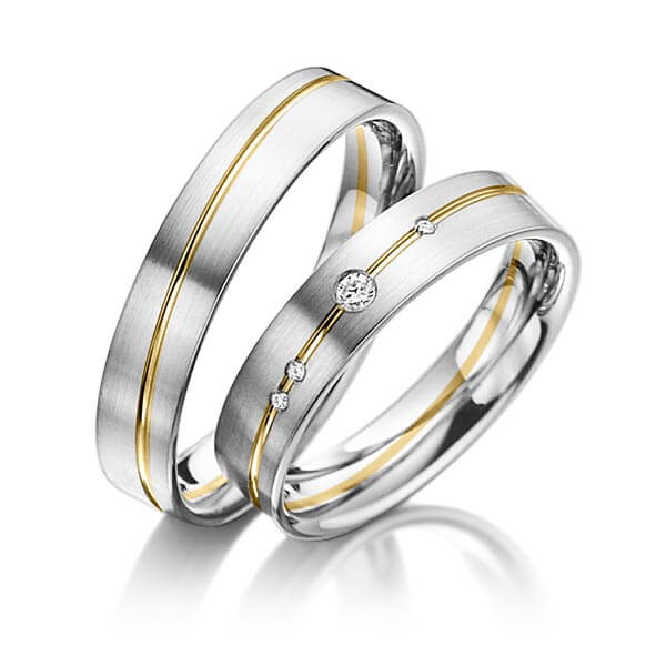 Set Bicolor trouwringen in grijsgoud 14 kt. geelgoud 14 kt. met in totaal 0,045 ct. Briljant tw/si van acredo - A-3017-5 Set Bicolor trouwringen in grijsgoud 14 kt. geelgoud 14 kt. met in totaal 0,045 ct. Briljant tw/si van acredo - A-3017-5