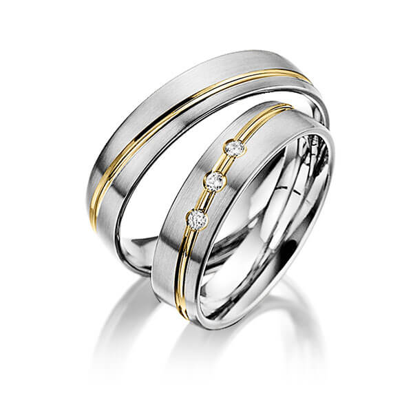 Set Bicolor trouwringen in grijsgoud 14 kt. geelgoud 14 kt. met in totaal 0,06 ct. Briljant tw/si van Steinberg - Q-1394-10 Set Bicolor trouwringen in grijsgoud 14 kt. geelgoud 14 kt. met in totaal 0,06 ct. Briljant tw/si van Steinberg - Q-1394-10