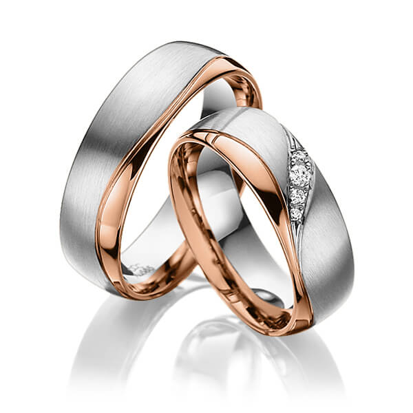 Set Bicolor trouwringen in grijsgoud 14 kt. roodgoud 14 kt. met in totaal 0,06 ct. Briljant tw/si van acredo - A-3022-14 Set Bicolor trouwringen in grijsgoud 14 kt. roodgoud 14 kt. met in totaal 0,06 ct. Briljant tw/si van acredo - A-3022-14