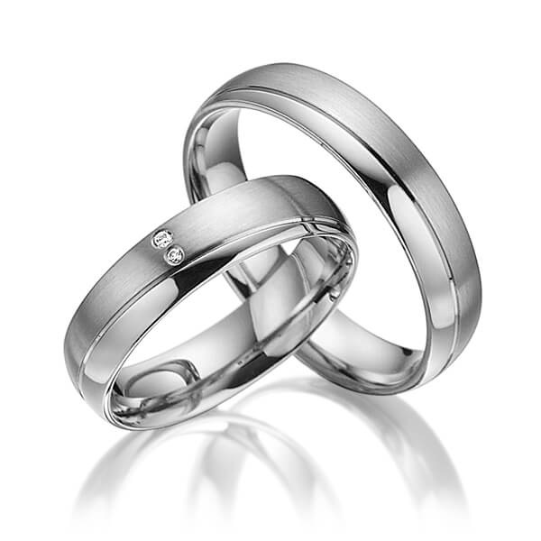 Set Klassieke trouwringen in grijsgoud 14 kt. met in totaal 0,015 ct. Briljant tw/si van acredo - A-3018-9 Set Klassieke trouwringen in grijsgoud 14 kt. met in totaal 0,015 ct. Briljant tw/si van acredo - A-3018-9