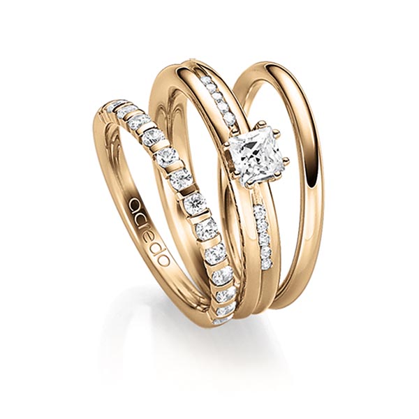 Triset in Roségold 585 halbausgefasst mit zus. 0,63 ct. Brillant & Prinzess-Diamant tw, vs tw, si von acredo - A-1454-2 Triset in Roségold 585 halbausgefasst mit zus. 0,63 ct. Brillant & Prinzess-Diamant tw, vs tw, si von acredo - A-1454-2