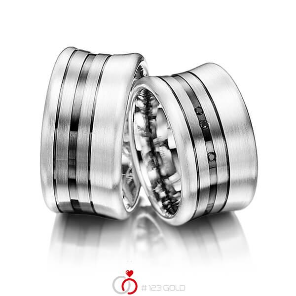 Paar bicolor Trauringe/Eheringe in Silber 925 Palladium 585 mit zus. 0,03 ct. Brillant schwarz von Merii - M-1067-1 Paar bicolor Trauringe/Eheringe in Silber 925 Palladium 585 mit zus. 0,03 ct. Brillant schwarz von Merii - M-1067-1
