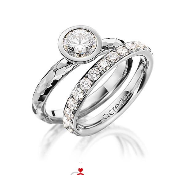 Paar klassische Trauringe/Eheringe in Weissgold 585 gehämmert Struktur mit 1 ct. + zus. 1,4 ct. Brillant r, if von acredo - A-1482-5 Paar klassische Trauringe/Eheringe in Weissgold 585 gehämmert Struktur mit 1 ct. + zus. 1,4 ct. Brillant r, if von acredo - A-1482-5