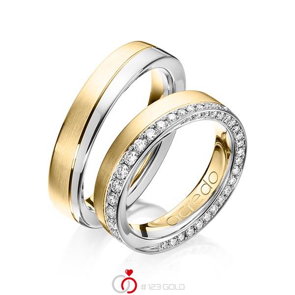 Set Bicolor trouwringen in grijsgoud 14 kt. geelgoud 14 kt. met in totaal 0,654 ct. Briljant tw/si van acredo - A-1156-9 Set Bicolor trouwringen in grijsgoud 14 kt. geelgoud 14 kt. met in totaal 0,654 ct. Briljant tw/si van acredo - A-1156-9