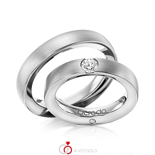 Set klassieke trouwringen in grijsgoud 14 kt. met 0,3 ct. + in totaal 0,03 ct. Briljant tw/si van acredo - A-1101-6 Set klassieke trouwringen in grijsgoud 14 kt. met 0,3 ct. + in totaal 0,03 ct. Briljant tw/si van acredo - A-1101-6