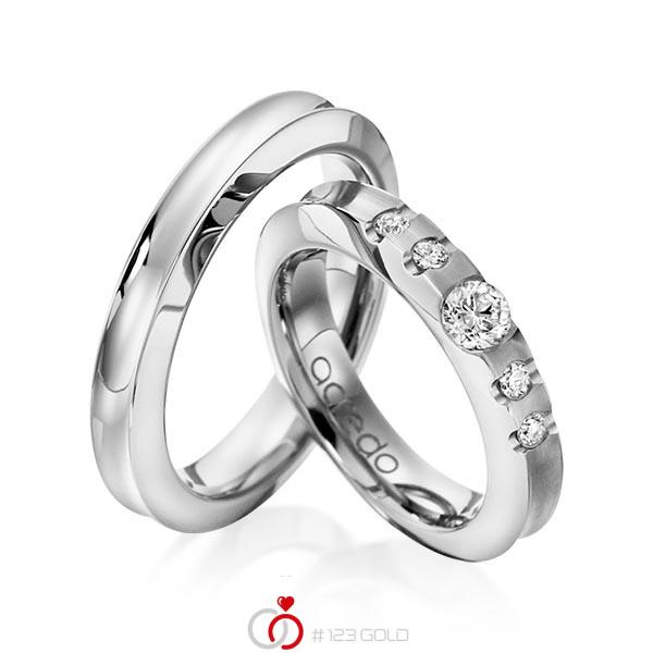 Set klassieke trouwringen in grijsgoud 14 kt. met 0,3 ct. + in totaal 0,12 ct. Briljant tw/si van acredo - A-1118-6 Set klassieke trouwringen in grijsgoud 14 kt. met 0,3 ct. + in totaal 0,12 ct. Briljant tw/si van acredo - A-1118-6