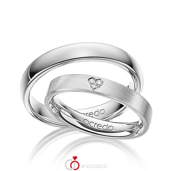Set klassieke trouwringen in grijsgoud 14 kt. met in totaal 0,021 ct. Briljant tw/si van acredo - A-1243-3 Set klassieke trouwringen in grijsgoud 14 kt. met in totaal 0,021 ct. Briljant tw/si van acredo - A-1243-3