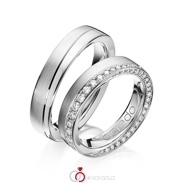 Set Klassieke trouwringen in grijsgoud 14 kt. met in totaal 0,654 ct. Briljant tw/si van acredo - A-1156-12 Set Klassieke trouwringen in grijsgoud 14 kt. met in totaal 0,654 ct. Briljant tw/si van acredo - A-1156-12