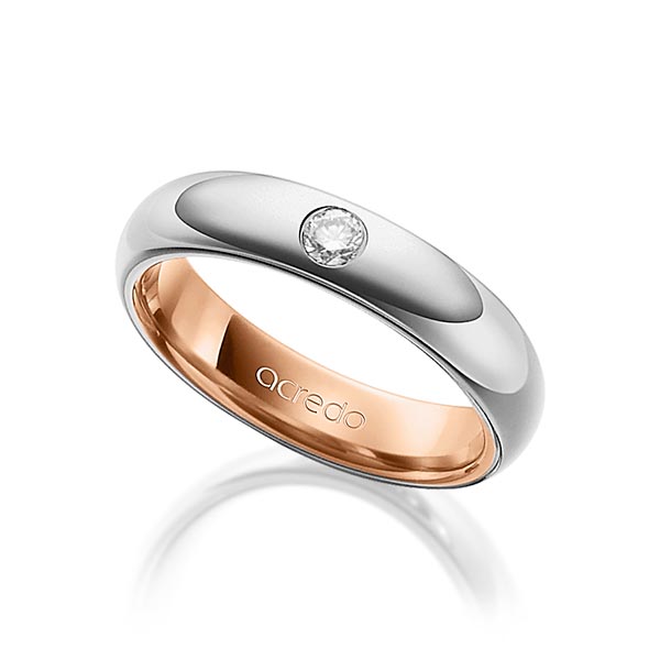 Bicolor trouwring in buiten grijsgoud 14 kt. , binnen roodgoud 14 kt. met in totaal 0,1 ct. Briljant tw/si van acredo