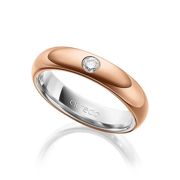 Bicolor trouwring in buiten roodgoud 14 kt. , binnen grijsgoud 14 kt. met in totaal 0,1 ct. Briljant tw/si van acredo