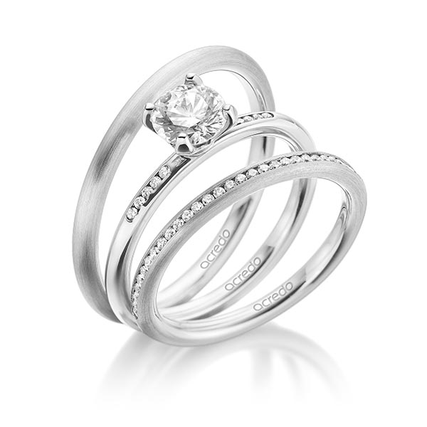 klassieke Memoire-trouwring in witgoud 14 kt. half gezet met in totaal 0,145 ct. Briljant tw/si van acredo