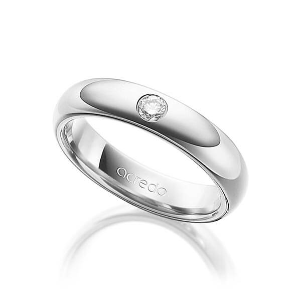 klassieke trouwring in buiten witgoud 14 kt. , binnen witgoud 14 kt. met in totaal 0,1 ct. Briljant tw/si van acredo