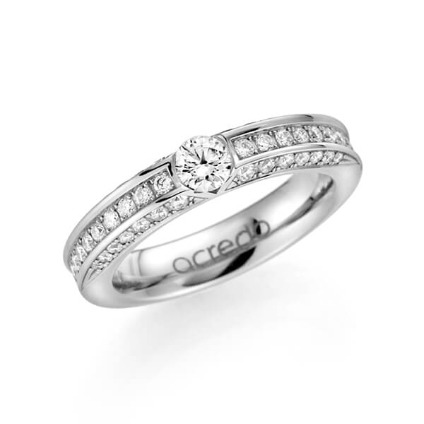 klassieke trouwring in witgoud 14 kt. met 0,3 ct. + in totaal 0,902 ct. Briljant tw/si van acredo