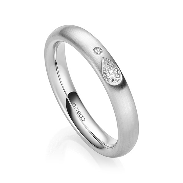 klassieke trouwring in witgoud 14 kt. met in totaal 0,108 ct. Briljant tw,vs tw/si van acredo