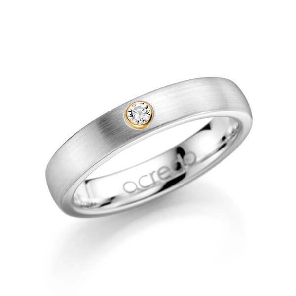klassieke trouwring in witgoud 14 kt. met in totaal 0,1 ct. Briljanten tw/si van acredo