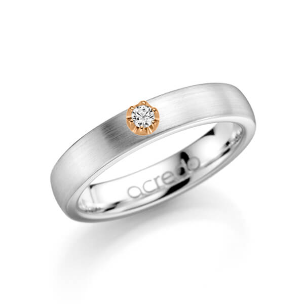 klassieke trouwring in witgoud 14 kt. met in totaal 0,1 ct. Briljanten tw/si van acredo