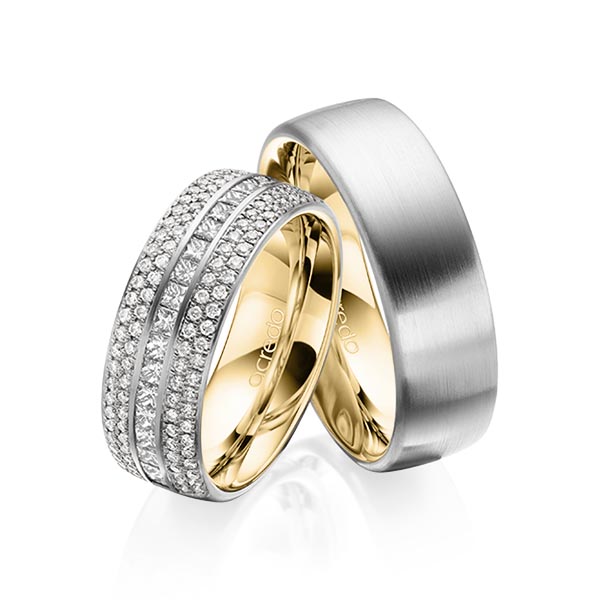 Paar bicolor Memoire-Trauringe/Eheringe in außen Graugold 585 , innen Gelbgold 585 halbausgefasst mit zus. 1,12 ct. Brillant & Prinzess-Diamant tw, si von acredo