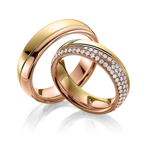 Paar bicolor Memoire-Trauringe/Eheringe in Gelbgold 585 Rotgold 585 vollausgefasst mit zus. 0,85 ct. Brillant tw, vs von 123GOLD