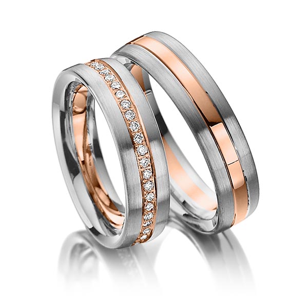 Paar bicolor Memoire-Trauringe/Eheringe in Palladium 585 Rotgold 585 vollausgefasst mit zus. 0,48 ct. Brillant tw, si von Steinberg
