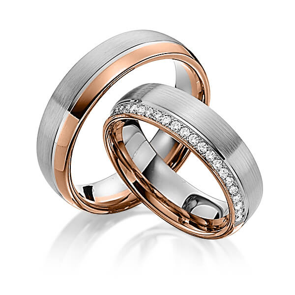 Paar bicolor Memoire-Trauringe/Eheringe in Rotgold 585 Graugold 585 halbausgefasst mit zus. 0,21 ct. Brillant tw, si von Steinberg
