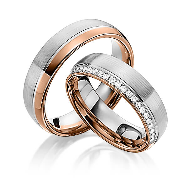 Paar bicolor Memoire-Trauringe/Eheringe in Rotgold 585 Weißgold 585 halbausgefasst mit zus. 0,21 ct. Brillant tw, si von Steinberg