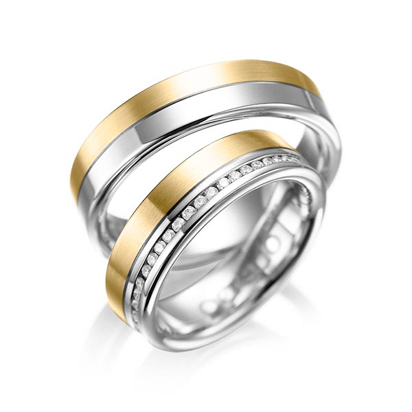 Paar bicolor Memoire-Trauringe/Eheringe in Weißgold 585 Gelbgold 585 vollausgefasst mit zus. 0,46 ct. Brillant tw, si von acredo