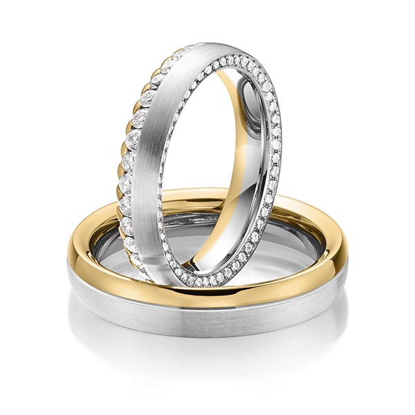 Paar bicolor Memoire-Trauringe/Eheringe in Weissgold 585 Gelbgold 585 vollausgefasst mit zus. 1,11 ct. Brillant tw, si von Steinberg