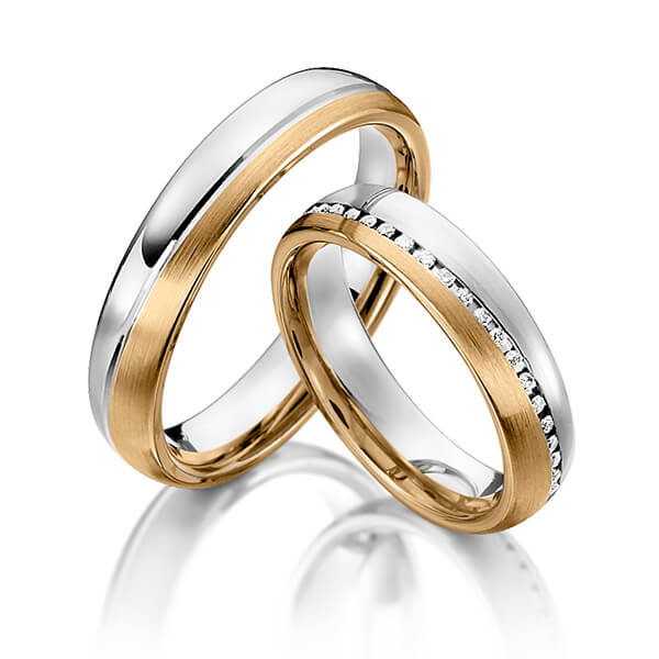 Paar bicolor Memoire-Trauringe/Eheringe in Weißgold 585 Roségold 585 vollausgefasst mit zus. 0,295 ct. Brillant tw, si von Steinberg