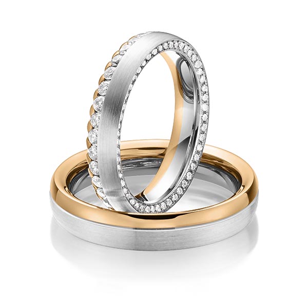 Paar bicolor Memoire-Trauringe/Eheringe in Weissgold 585 Roségold 585 vollausgefasst mit zus. 1,11 ct. Brillant tw, si von Steinberg