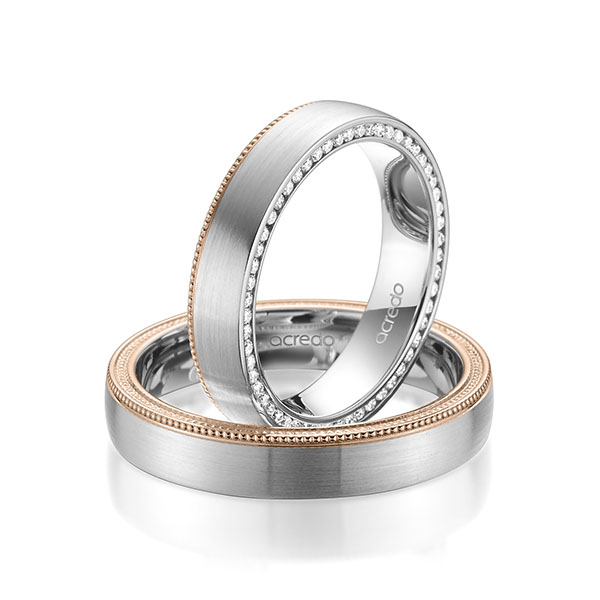 Paar bicolor Memoire-Trauringe/Eheringe in Weißgold 585 Rotgold 585 vollausgefasst mit zus. 0,275 ct. Brillant tw, si von acredo