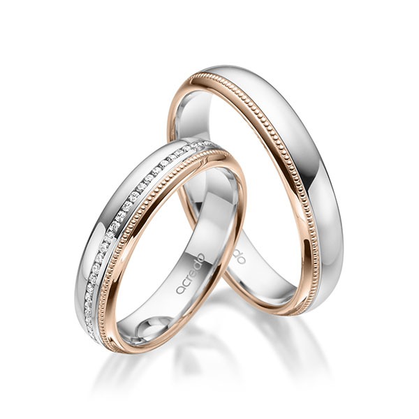 Paar bicolor Memoire-Trauringe/Eheringe in Weißgold 585 Rotgold 585 vollausgefasst mit zus. 0,295 ct. Brillant tw, si von acredo - A-1772-1 Paar bicolor Memoire-Trauringe/Eheringe in Weißgold 585 Rotgold 585 vollausgefasst mit zus. 0,295 ct. Brillant tw, si von acredo - A-1772-1