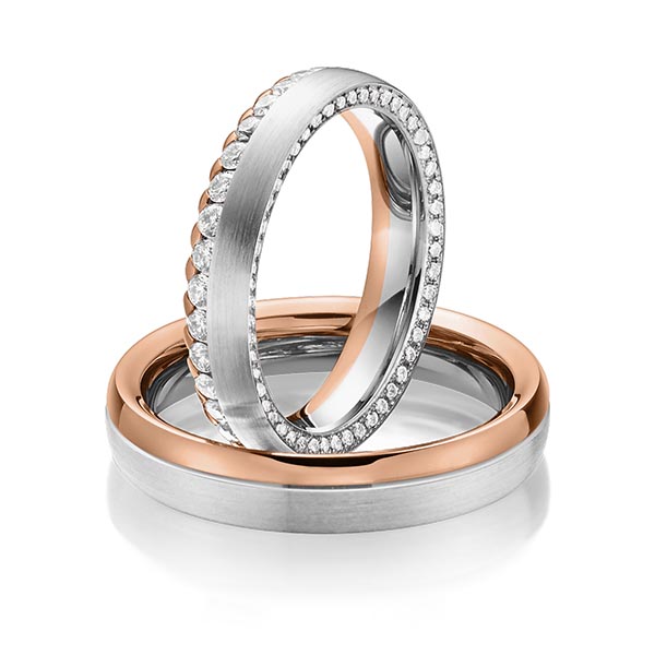 Paar bicolor Memoire-Trauringe/Eheringe in Weissgold 585 Rotgold 585 vollausgefasst mit zus. 1,11 ct. Brillant tw, si von Steinberg