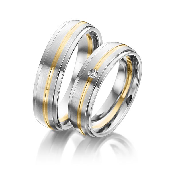 Paar bicolor Trauringe/Eheringe in Edelstahl Gelbgold 585 mit zus. 0,025 ct. Brillant tw, si von 123GOLD