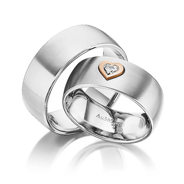 Paar bicolor Trauringe/Eheringe in Edelstahl Rotgold 585 mit zus. 0,12 ct. Herz-Diamant tw, vs von 123GOLD