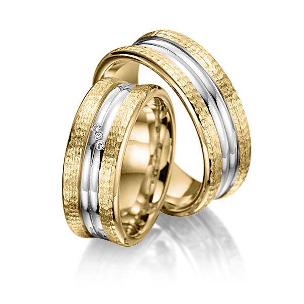Paar bicolor Trauringe/Eheringe in Gelbgold 585 Weissgold 585 gehämmert Struktur, mit zus. 0,015 ct. Brillant tw, si von Merii