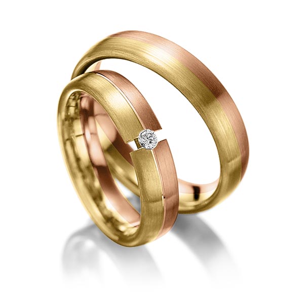 Paar bicolor Trauringe/Eheringe in Rotgold 585 Gelbgold 585 mit zus. 0,05 ct. Brillant tw, si von 123gold - Y-1051-7 Paar bicolor Trauringe/Eheringe in Rotgold 585 Gelbgold 585 mit zus. 0,05 ct. Brillant tw, si von 123gold - Y-1051-7