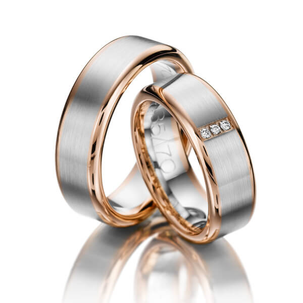 Paar bicolor Trauringe/Eheringe in Rotgold 585 Weißgold 585 mit zus. 0,03 ct. Brillant tw, vs von acredo - S-1064-1 Paar bicolor Trauringe/Eheringe in Rotgold 585 Weißgold 585 mit zus. 0,03 ct. Brillant tw, vs von acredo - S-1064-1