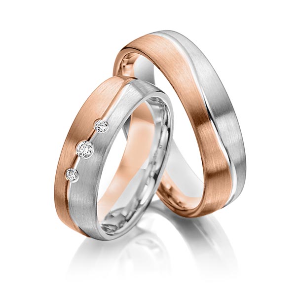 Paar bicolor Trauringe/Eheringe in Rotgold 585 Weißgold 585 mit zus. 0,08 ct. Brillant tw, si von Steinberg Paar bicolor Trauringe/Eheringe in Rotgold 585 Weißgold 585 mit zus. 0,08 ct. Brillant tw, si von Steinberg