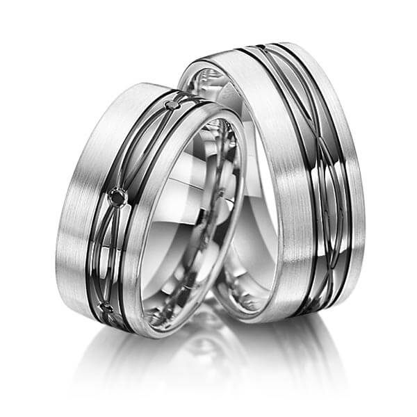 Paar bicolor Trauringe/Eheringe in Silber 925 Palladium 500 mit zus. 0,06 ct. Brillant schwarz von Merii