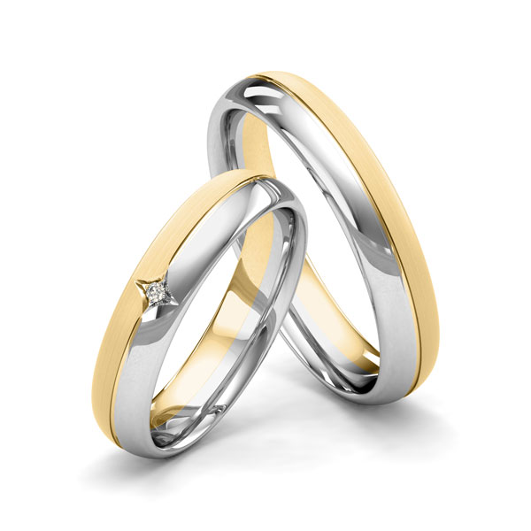 Paar bicolor Trauringe/Eheringe in Weißgold 375 Gelbgold 375 mit zus. 0,01 ct. Brillant tw, si von Merii - M-1196-1 Paar bicolor Trauringe/Eheringe in Weißgold 375 Gelbgold 375 mit zus. 0,01 ct. Brillant tw, si von Merii - M-1196-1