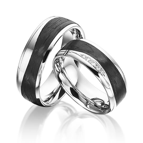 Paar Carbon Trauringe/Eheringe in Weissgold 585 Weissgold 585 Carbon-Einzug mit zus. 0,045 ct. Brillant tw, si von 123gold - Y-1350-11 Paar Carbon Trauringe/Eheringe in Weissgold 585 Weissgold 585 Carbon-Einzug mit zus. 0,045 ct. Brillant tw, si von 123gold - Y-1350-11