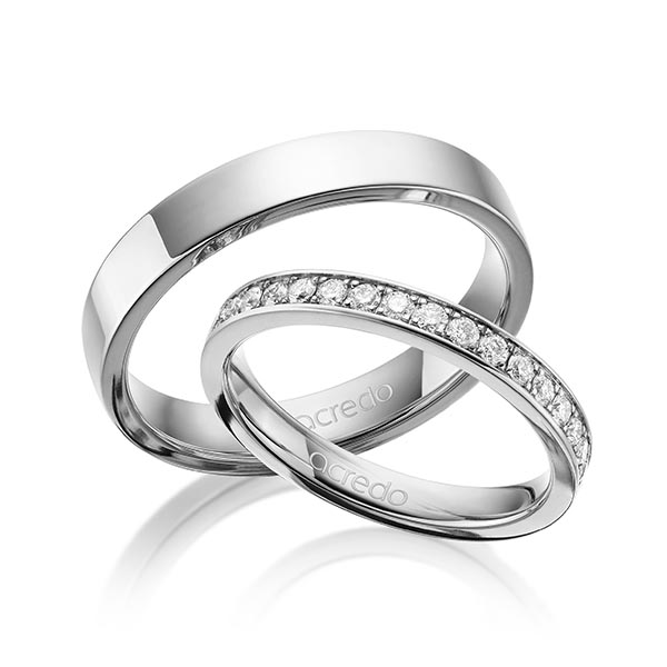 Paar klassische Memoire-Trauringe/Eheringe in außen Graugold 585 , innen Graugold 585 halbausgefasst mit zus. 0,36 ct. Brillant tw, si von acredo