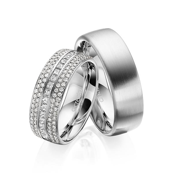 Paar klassische Memoire-Trauringe/Eheringe in außen Graugold 585 , innen Graugold 585 halbausgefasst mit zus. 1,12 ct. Brillant & Prinzess-Diamant tw, si von acredo